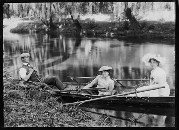 Two women and a man in a rowboat on the Avon River, 1900