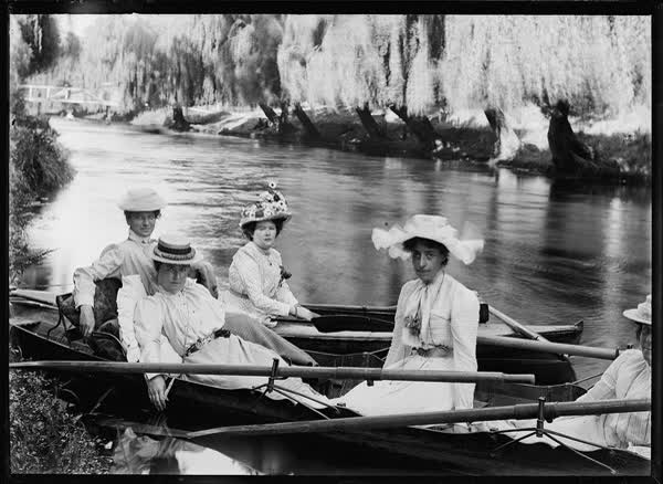 Five women in rowboats on the Avon River, 1900