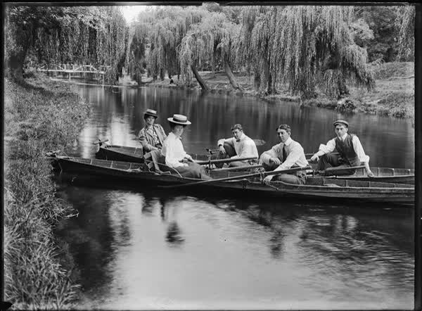 Three men and two women in two rowboats on the Avon River, 1900