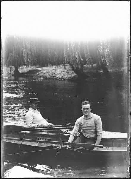 Two men in a canoe and a rowboat on the Avon River, 1900