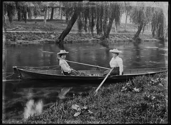 Woman and girl in a rowboat on the Avon River, 1900