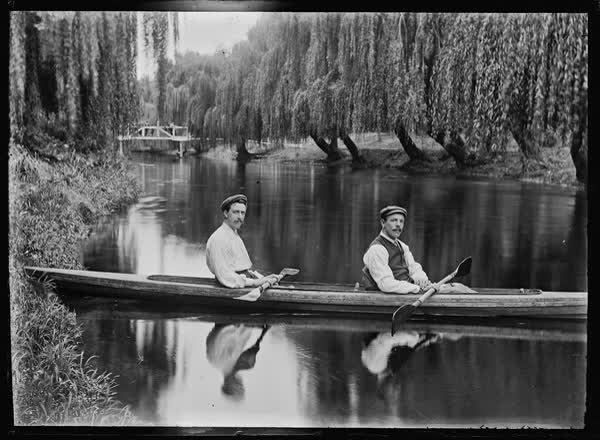 Two men in a double canoe on the Avon River, 1900