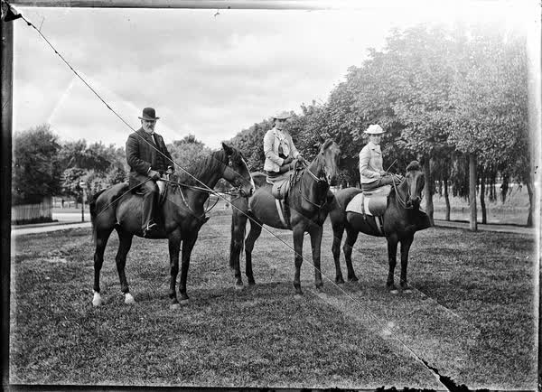 Man and two women riding horses in Hagley Park, 1900