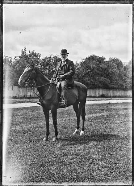 Man riding a horse in Hagley Park, 1900