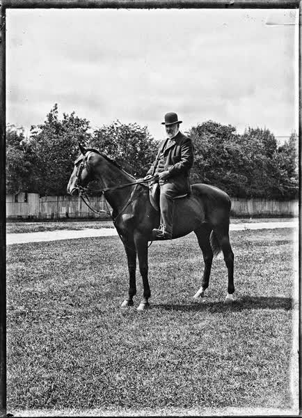 Man riding a horse in Hagley Park, 1900