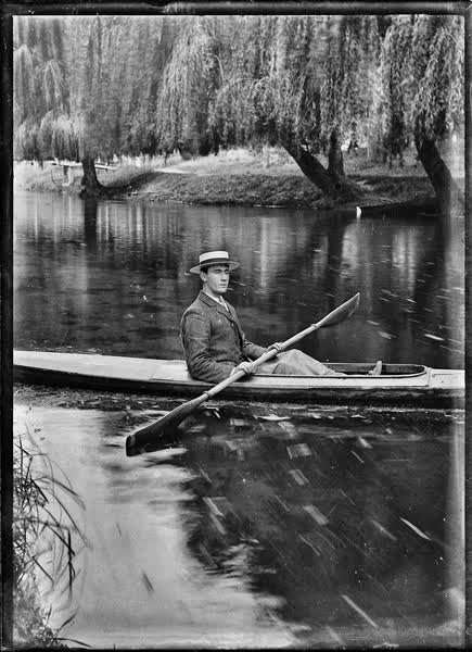 Man in a canoe on the Avon River, 1900