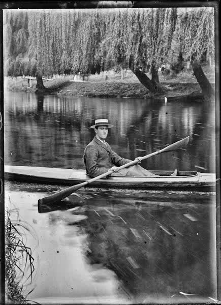 Man in a canoe on the Avon River, 1900