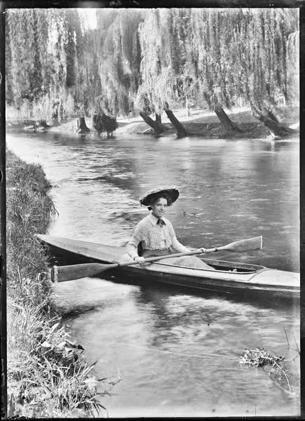 Woman in a canoe on the Avon River, 1900