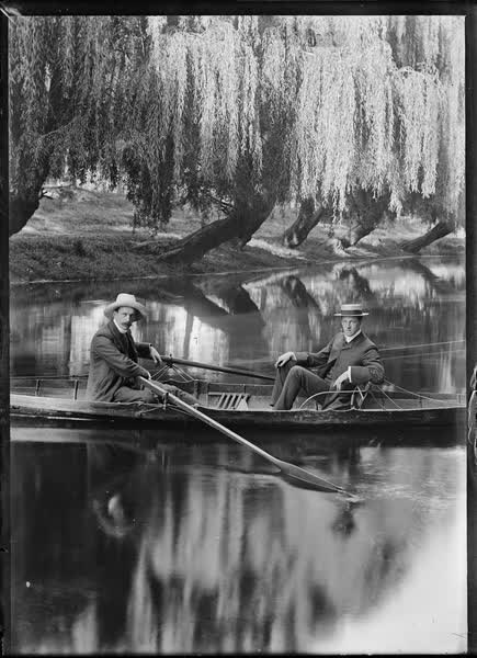 Two men in a rowboat on the Avon River, 1900