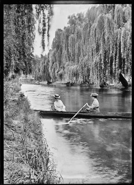 Two women in a rowboat on the Avon River, 1900