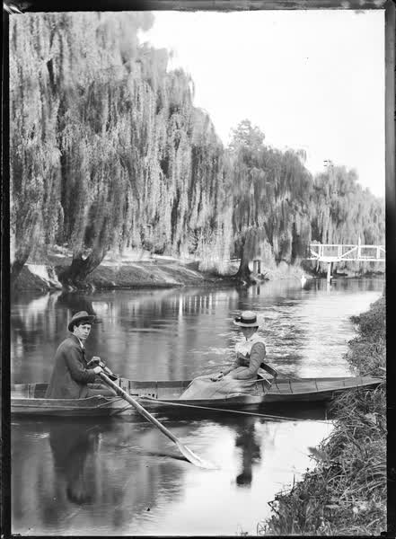Man and woman in a rowboat, 1900