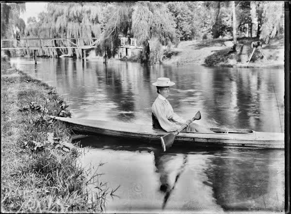 Woman in a canoe on the Avon River, 1900