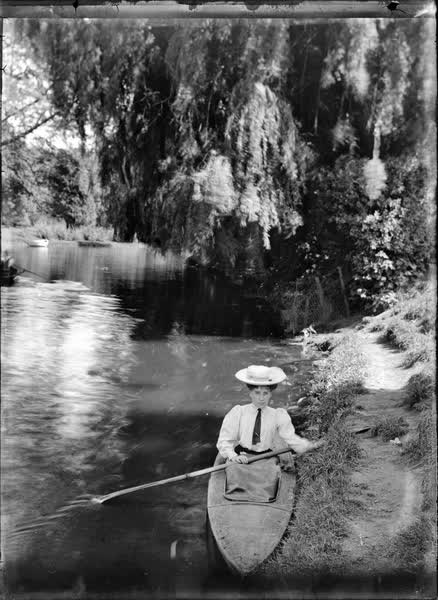 Woman in a canoe on the Avon River, 1900