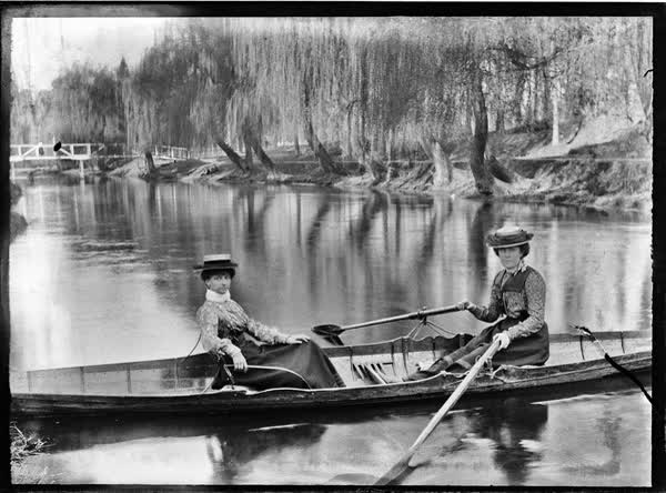 Two women in a rowboat on the Avon River, 1900