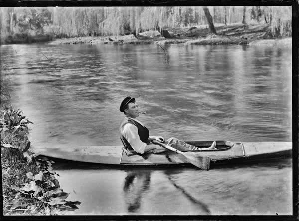 Man in a canoe on the Avon River, 1900
