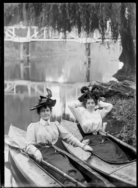Two women in canoes on the Avon River, 1900