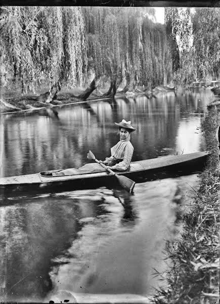 Woman in a canoe on the Avon River, 1900