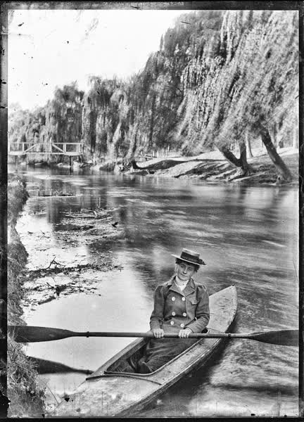 Woman in a canoe on the Avon River, 1900