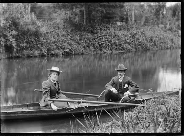 Woman and man in a rowboat on the Avon River, 1900