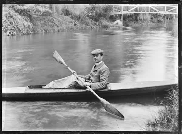 Man in a canoe on the Avon River, 1900