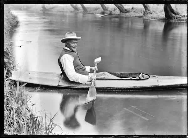 Man in a canoe on the Avon River, 1900