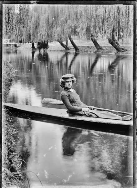 Woman in a canoe on the Avon River, 1900