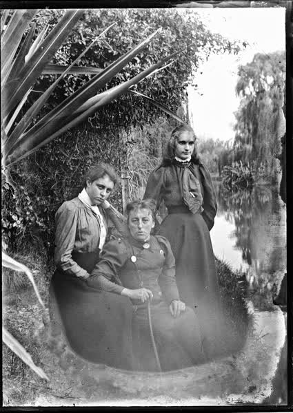 Two women and a girl by the Avon River, 1900