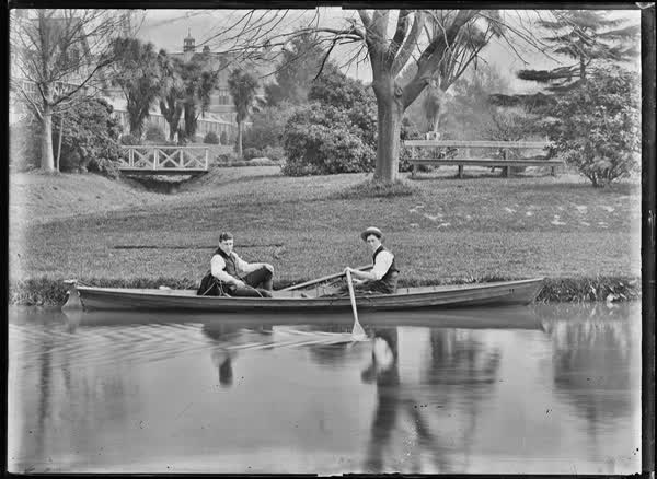 Two men in a rowboat on the Avon River, 1900