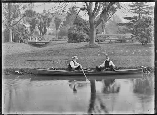 Two men in a rowboat on the Avon River, 1900