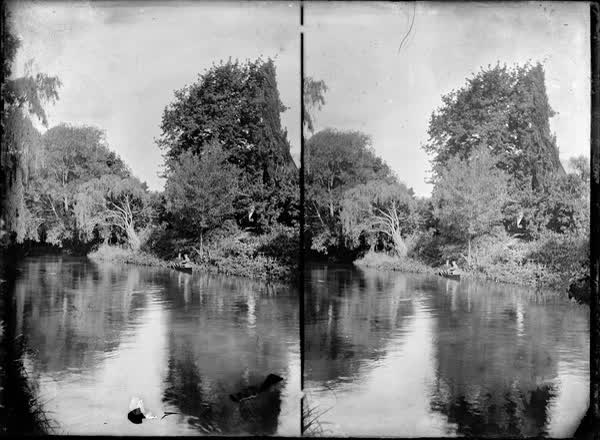 Two men in a rowboat on the Avon River, 1900