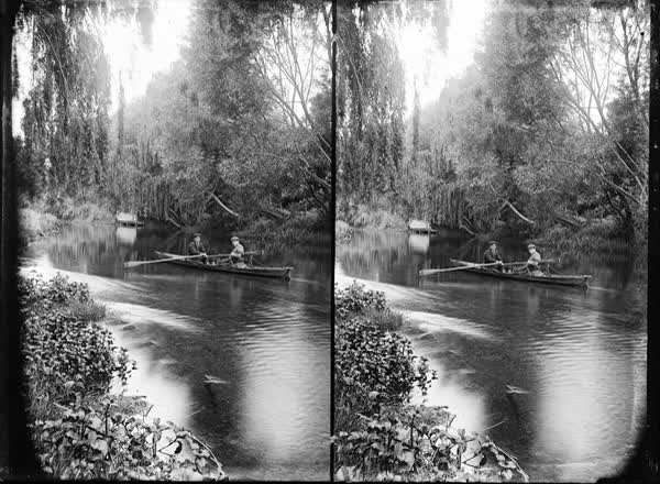 Two men in a rowboat on the Avon River, 1900
