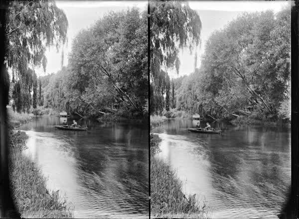 Two men in a rowboat on the Avon River, 1900