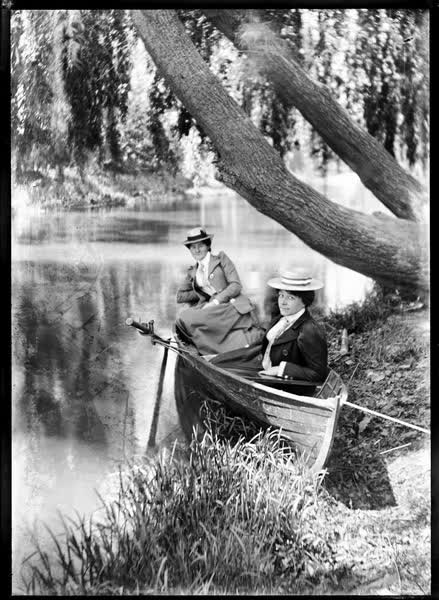 Two women in a rowboat on the Avon River, 1900