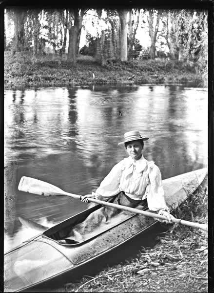 Woman in a canoe on the Avon River, 1900