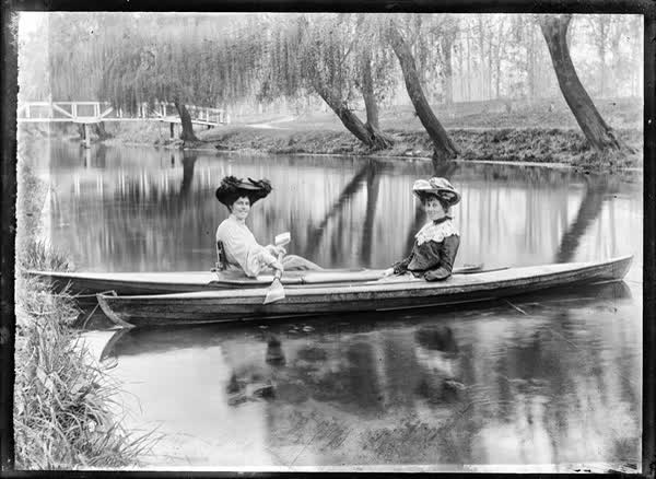 Two women in canoes on the Avon River, 1900