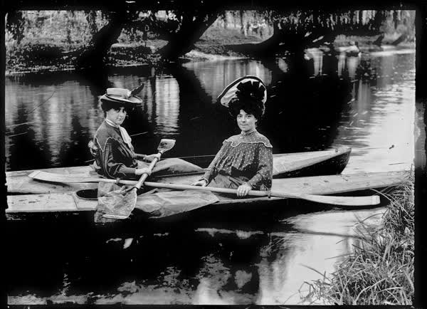 Two women in canoes on the Avon River, 1900