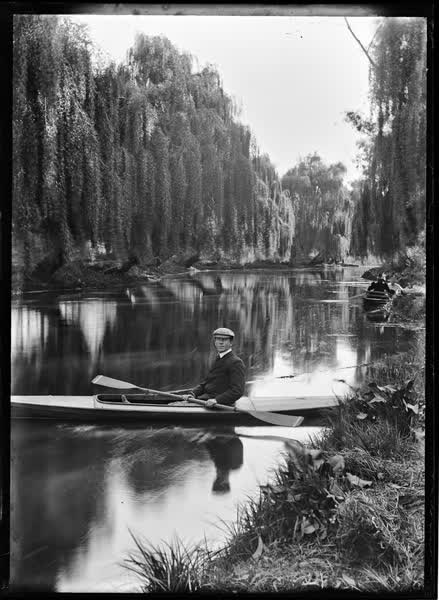 Man in a canoe on the Avon River, 1900