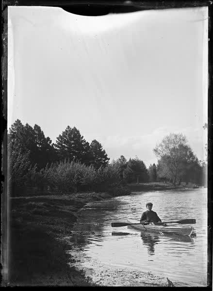 Man in a canoe on the Avon River, 1900