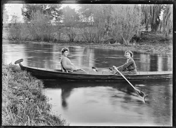 Two women in a rowboat on the Avon River, 1900