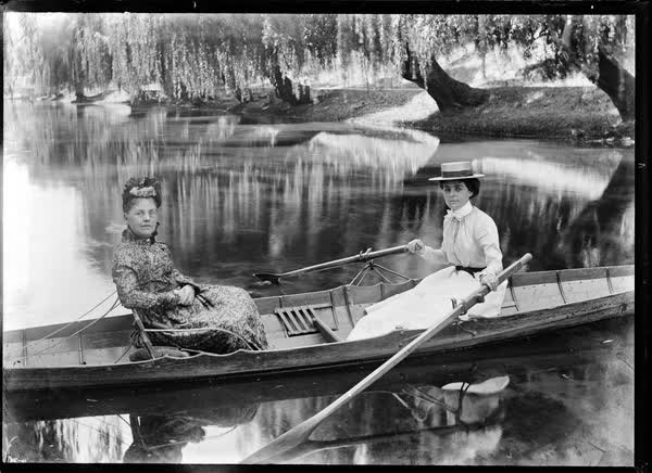 Two women in a rowboat on the Avon River, 1900