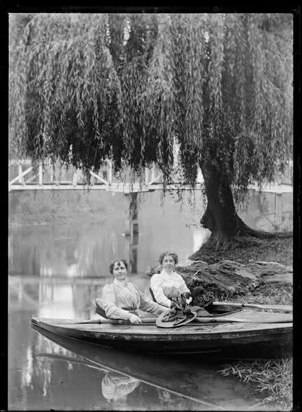 Two women in canoes on the Avon River, 1900