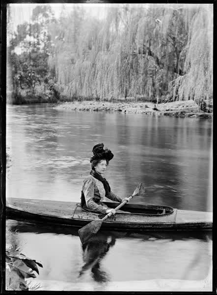 Woman in a canoe on the Avon River, 1900