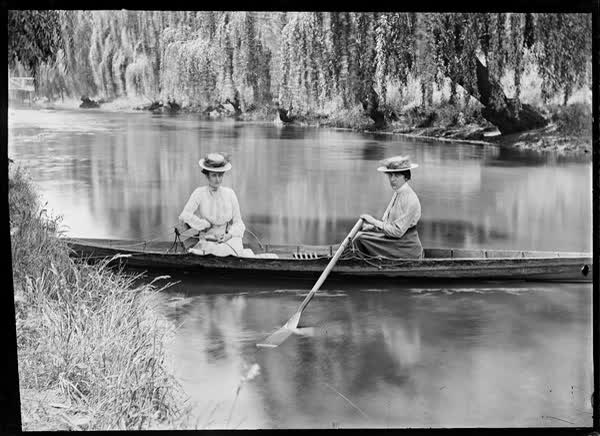 Two women in a rowboat on the Avon River, 1900