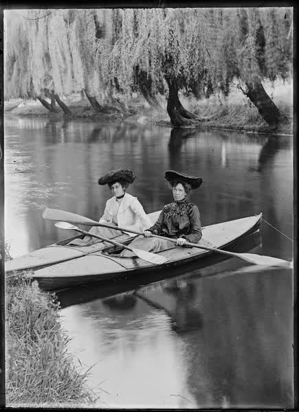 Two women in canoes on the Avon River, 1900