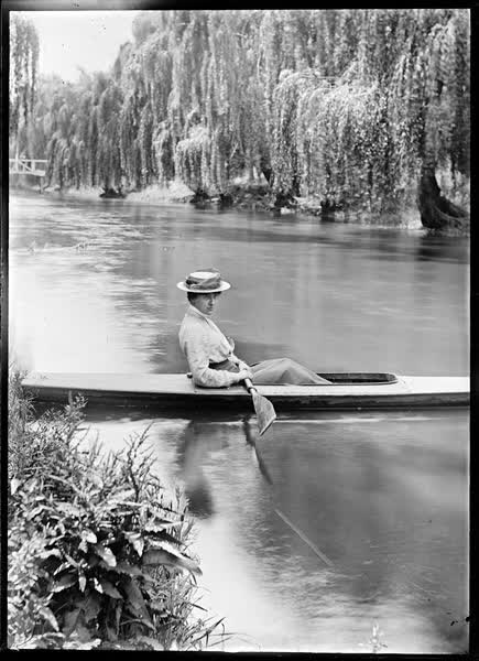 Woman in a canoe on the Avon River, 1900