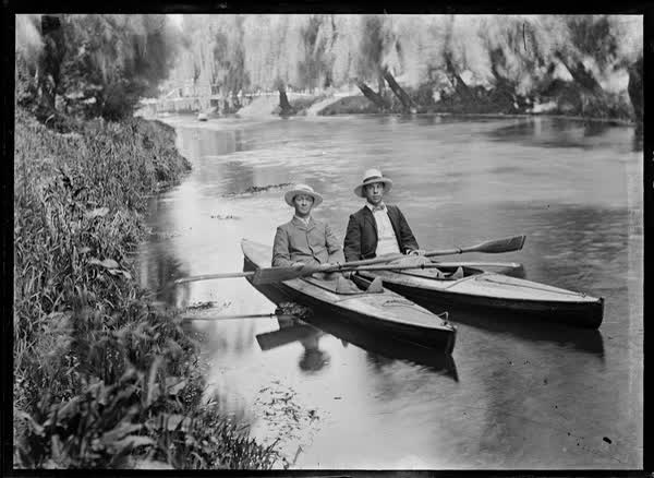Two men in canoes on the Avon River, 1900