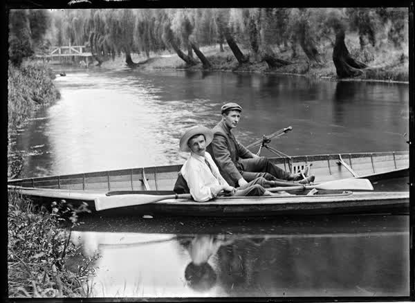 Two men in a rowboat and a canoe on the Avon River, 1900