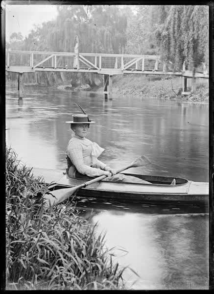 Woman in a canoe on the Avon River, 1900