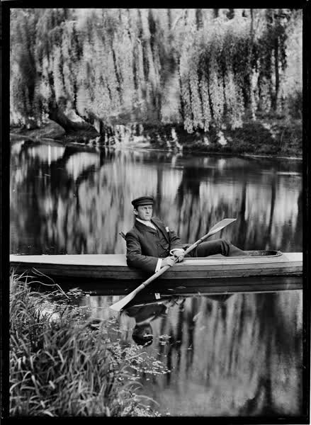 Man in a canoe on the Avon River, 1900