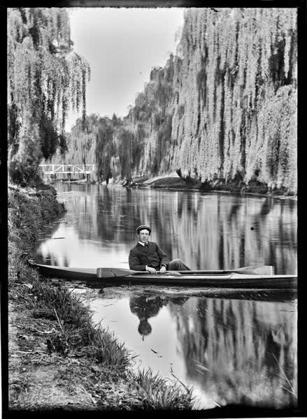 Man in a canoe on the Avon River, 1900